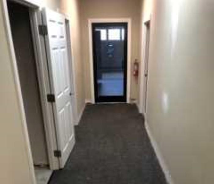 Hall way in commercial office after water was removed